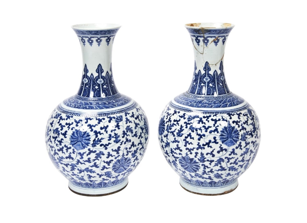 LARGE PAIR OF BLUE AND WHITE 'LOTUS' VASES QING DYNASTY, 19TH CENTURY painted in tones of underglaze