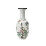 FAMILE ROSE BALUSTER VASE QING DYNASTY, 19TH CENTURY the baluster sides painted with an exotic