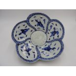 JAPANESE IMARI BLUE AND WHITE LOBED DISH 18TH CENTURY depicting children in various poses 25cm