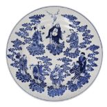 UNUSUAL 'IMMORTALS' SOFT-PASTE BLUE AND WHITE DISH PROBABALY JAPANESE, 18TH CENTURY painted in tones