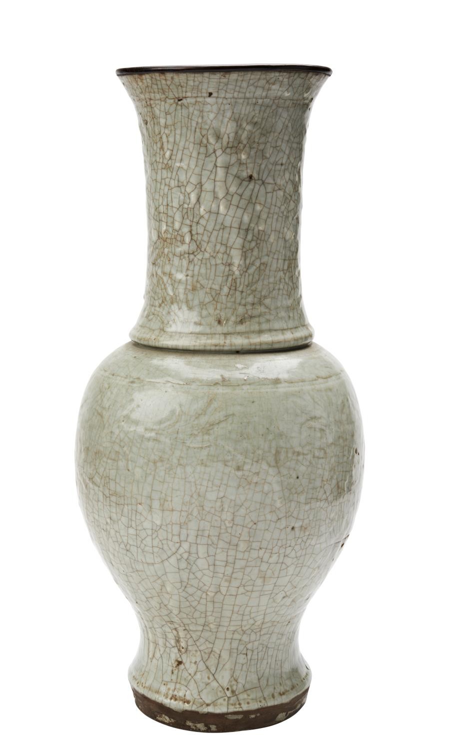 CELADON-GLAZED BALUSTER VASE MING DYNASTY the sides with incised foliate decoration 43cm high  PROVE