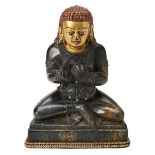 HARDSTONE FIGURE OF A SEATED BUDDHA SINO-TIBETAN, 20TH CENTURY the seated figure with a gilt painted