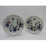 PAIR OF IMARI ENAMELLED PLATES EDO PERIOD, 18TH CENTURY painted in tones of underglaze blue, red,