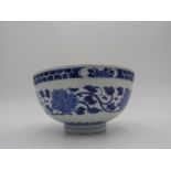 BLUE AND WHITE 'FISH AND LOTUS' BOWL KANGXI PERIOD painted in tones of cobalt blue with meandering