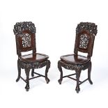 PAIR OF CARVED HUANGHUALI SIDE CHAIRS QING DYNASTY, 19TH CENTURY the chairs each carved throughout