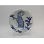 BLUE AND WHITE 'QILIN' DISH EDO PERIOD, 18TH CENTURY painted with a qilin in a verdant landscape