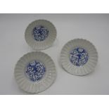 THREE JAPANESE BLUE AND WHITE 'CHRYSANTHEMUM' DISHES 17TH CENTURY painted in underglaze blue with ?