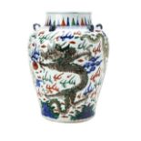 WUCAI 'DRAGON' JAR KANGXI PERIOD the baluster sides boldly painted in coloured enamels with