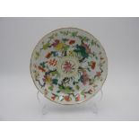 FAMILLE ROSE DISH DAOGUANG SEAL MARK AND POSSIBLY OF THE PERIOD painted with blossoming stems 18cm
