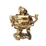 LARGE GILT-BRONZE PEACH-FORM CENSER AND STAND QING DYNASTY of naturalistic form, the sides decorated