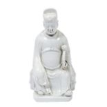 BLANC DE CHINE FIGURE OF WENCHANG KANGXI PERIOD  the seated Daoist god wearing an officials hat