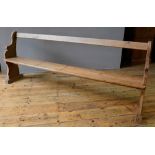 WAXED PINE OPEN BACK PEW SEAT WITH SINGLE SLAT BACK AND SHAPED ENDS (205cm wide, 32cm deep, 83cm