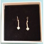 PAIR OF DIAMOND DROP EARRINGS each with round cut diamond, on fish hook fastner, approx. 3.2cm