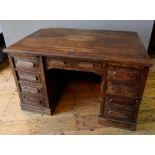 1930S OAK TWIN PEDESTAL OFFICE DESK EACH PEDESTAL COMPRISING OF 3 DRAWERS WITH CENTRAL DRAWER