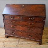 GEORGIAN OAK 5-DRAWER WRITING BUREAU WITH FITTED INTERIOR COMPARTMENTS, and two narrow drawers