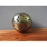 BRASS SPHERICAL BRASS HAND WARMER OR ROLLING LAMP INDIAN, 19TH CENTURY the pierced sides decorated