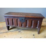 MINIATURE OAK COFFER CIRCA 1900 in the arts and crafts style 17cm high, 31.5cm wide