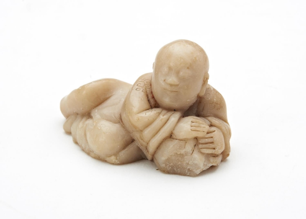 THREE SOAPSTONE CARVINGS LATE QING DYNASTY comprising a 'bamboo' snuff bottle and two figures