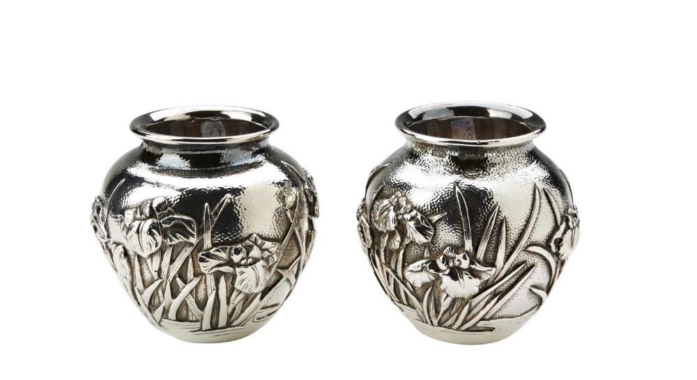 FINE PAIR OF SILVER EXPORT 'LOTUS' VASES QING DYNASTY, 19TH CENTURY the ovoid sides finely decorated