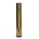 A LARGE BRASS SHELL CASE marked RLB 1963 QX 1235, used as a stick stand 79 cm high