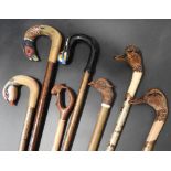 SEVEN 20TH CENTURY SCOTTISH WOOD AND HORN WALKING STICKS variously carved as game birds