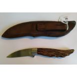 A GEOFF HAGUE FIXED BLADE KNIFE with palm wood handle, signed and with leather sheath 20.5 cm