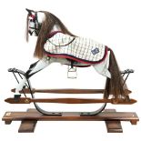 A STEVENSON BROTHERS GOLDEN JUBILEE SPECIAL EDITION COACH-SPRUNG TRESTLE ROCKING HORSE with