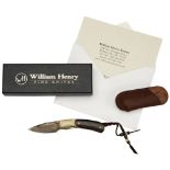 A good William Henry 'Kestrel' folding pocket knife with black palm wooden handle, damascened