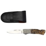 A FINE GEOFF HAGUE FOLDING POCKET KNIFE, the burr-wood handle with acid relief decorated guard and