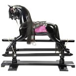 A STEVENSON BROTHERS SPECIAL EDITION MILLENNIUM TRESTLE ROCKING HORSE in black with black mane and