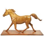 A LARGE CONTEMPORARY CARVED WOODEN SCULPTURE OF A GALLOPING HORSE on a wooden platform base 132 cm x