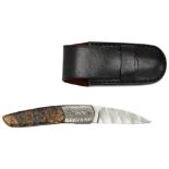 A FINE GEOFF HAGUE FOLDING POCKET KNIFE the burr-wood handle with acid relief decorated guard, the