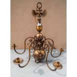 A 20th CENTURY DUTCH STYLE GILDED METAL 6 BRANCH CENTRAL LIGHT FITTING with eagle decoration 75cm