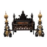 AN ORNATE FRENCH FIREGRATE the pierced basket flanked by two brass stanchions with decorative masks.