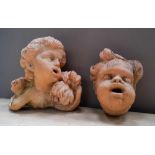 TWO CONTEMPORARY  CHERUB DECORATED TERRACOTTA WALL FOUNTS 24cm x 28cm