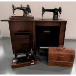 A SINGER TREADLE SEWING MACHINE IN AN OAK CABINET and three other table top sewing machines. 76 x 58