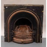 A VICTORIAN  STYLE CAST IRON FIRE GRATE INSERT, the arched top front plate with bowfront grate,
