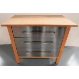 A MODERN KITCHEN ISLAND with wood block top and metal fronted drawers. 90 x 106 x 66 cms
