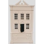 AN ARCHITECTURAL PAINTED NURSERY CABINET IN THE FORM OF A GEORGIAN TOWN HOUSE with swan neck
