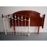 A MODERN POLISHED WOODEN HEADBOARD and a 20th century cast iron bed end. 118 x 162 cms max
