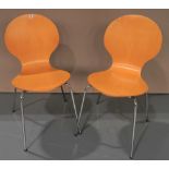 A SET OF FOUR 'ANT' STYLE METAL AND STEAMED PLY CHAIRS, light wood. 86 cm high