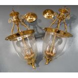 A PAIR OF BRASS MOUNTED HUNDI CENTRAL HANGING LANTERNS WITH GLASS BELL SHADES 56cm high