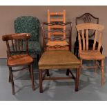 A CHIPPENDALE STYLE LADDERBACK CHAIR WITH LEATHER SEAT and six other assorted chairs. 82 cm high