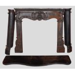 A CAST IRON FRENCH FIRE SURROUND IN 19TH CENTURY STYLE, in four parts with curved side supports. 124