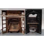 A VICTORIAN VCAST IRON FIRE INSERT with ornate cast decoration and another cast iron insert. 88 x 82