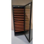 A EUROCAVE GLASS FRONTED WINE FRDIGE with fourteen pull out wooden fronted trays. 173 x 63 x 58 cms