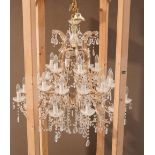 A THIRTY BRANCH FRENCH STYLE CAGE CHANDELIER with moulded glass elements, swags and pendants 90cm