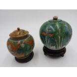 AN ORIENTAL PATTERN AMBER GLAZE 20th CENTURY JAR WITH LID AND A FRENCH WOODLAND SCENE DECORATED