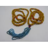 TWO CHINESE YELLOW GLASS BEAD NECKLACES 20TH CENTURY (2)