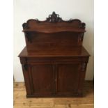 VICTORIAN MAHOGANY CHIFFONIER WITH TWO PANELLED DOORS,single drawer and carved serpentine back panel